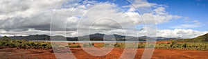 Panorama on the mountains and red soil of the South of Grande Terre, New Caledonia