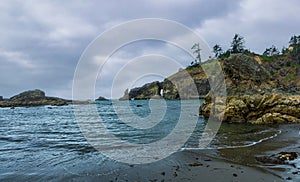 Panorama of the Natural arch around the bend at Second Beach Olympic National Park