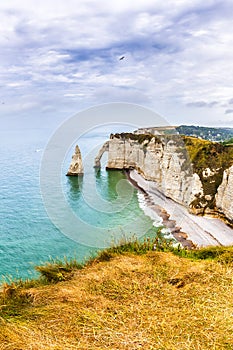 Panorama of natural chalk cliffs of Etretat