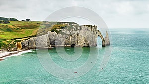 Panorama of natural chalk cliffs of Etretat