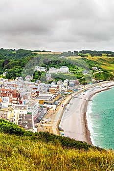 Panorama of natural chalk cliffs of Etretat