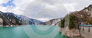 Panorama of nature dam snow mountain range landscape with blue sky from matsumoto to Toyama, Tateyama Kurobe Alpine Route, Japan A