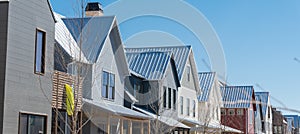 Panorama new development townhome with metal roof and covered gutters near Oklahoma City, US