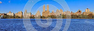 Panorama of New York Manhattan Upper west side skyline across the Jacqueline Kennedy Onassis Reservoir in Central Park