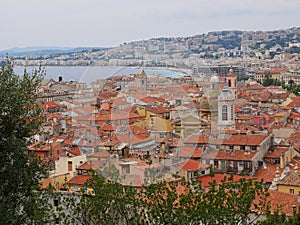 Panorama of Nice from the observation deck. View of the city and the sea, French Riviera. Picturesquee tile roofs