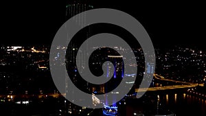 Panorama of night city Ekaterinburg, Russia. Stock footage. Aerial view of colorful lights in the streets of night