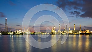 Panorama night oil refinery river front