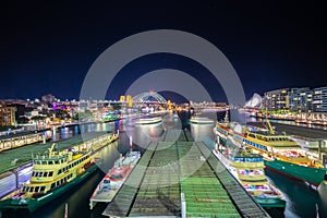 Panorama night view of Sydney Harbour and City Skyline of circular quay the bridge nsw Australia