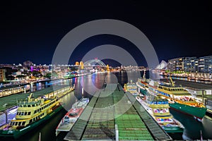 Panorama night view of Sydney Harbour and City Skyline of circular quay the bridge nsw Australia