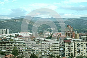 Panorama of North Mitrovica, the serbian part of the town, with crumbling residential buildings, It is a symbol of the division