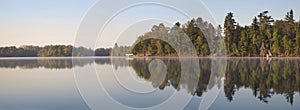 Panorama of Northern Minnesota Lakeshore on a Calm Morning During Spring photo