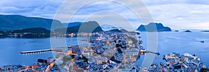 Panorama of Norwegian port town Alesund in evening time photo