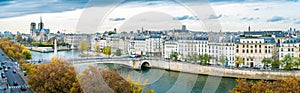 Panorama of Notre-dame-de-Paris and Seine river in autumn photo