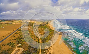 Panorama of ocean coastline and Bass Highway.