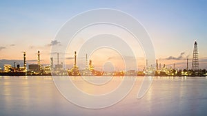 Panorama oil refinery river front during sunrise