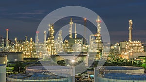 Panorama of Oil refinery and storage tanks at twilight