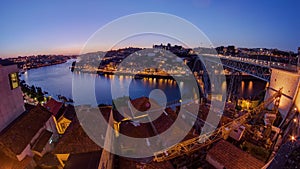 Panorama of old city Porto at river Duoro after sunset day to night timelapse, Oporto, Portugal