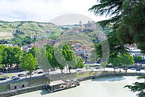Panorama of old Tbilisi center, architecture building, church, river in summer sunny day, landscape