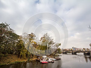 Panorama of the Old Town of Prague, Czech Republic, with focus Prague Castle Prazsky hrad seen from the Vltava river in autumn.