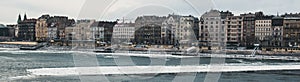 Panorama of the old vintage houses over the river Danube in Budapest on, the river floating ice