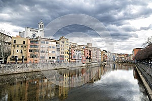 Panorama of olds buildings on the riverbank in Girona, Catalonia, Spain photo