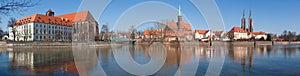 Panorama of Ostrow Tumski island, Odra (Oder) river and towers of gothic Cathedral of St. John the Baptist in Wroclaw