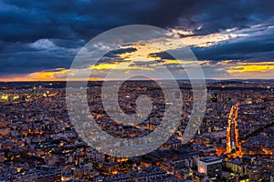 Panorama of Paris city from the Montparnasse tower at dusk. France