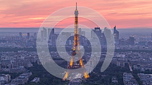 Panorama of Paris after sunset day to night timelapse. Eiffel tower view from montparnasse building in Paris - France