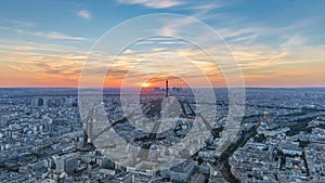 Panorama of Paris at sunset timelapse. Eiffel tower view from montparnasse building in Paris - France