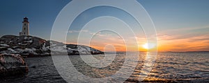 Panorama of Peggys Cove's Lighthouse at Sunset