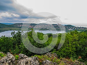 Panorama of the peninsula Tihany, Hungary, country side.Blick on the Benedictine abbey and the crater lake with deep gray