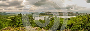 Panorama of the peninsula Tihany, Hungary, country side.Blick on the Benedictine abbey and the crater lake with deep gray