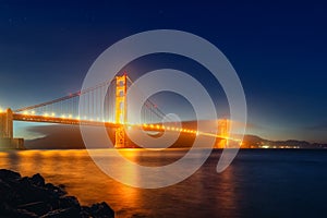 Panorama photo of Golden Gate Bridge at night time, San Francisco