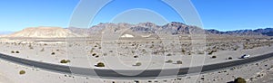 Panorama photo of the great landscape of Death Valley with dramatic cloudy sky. Desert. USA, California