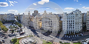 Panorama photo of PlaÃ§a de l`Ajuntament with fountain, taken from a rooftop, Valencia, Spain