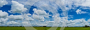 Panorama photos nature sky background daytime sky with clouds in the rainy season over the field