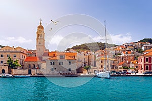 Panorama of picturesque town Pucisca in Croatia, Island Brac, Europe. Pucisca town mediterranean panorama with seagull's flying