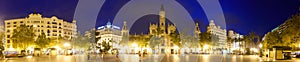 Panorama of Placa del Ajuntament in evening. Valencia