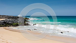 Panorama of Playa de las Conchas beach with blue ocean and white sand. La Graciosa, Lanzarote, Canary Islands, Spain.