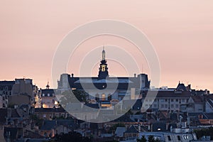 Panorama of Poitiers with city hall at sunset photo