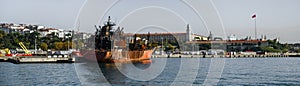 Panorama of the port of Istanbul Kadikoy rusty old abandoned ship photo