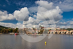 Panorama of Prague Castle and Charles bridge in autumn sunny day. Prague.