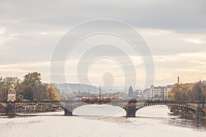 Panorama of Prague, Czech Republic, seen from the Vltava river, also called Moldau, with a focus on Most Legii, or Legion Most