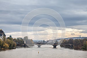 Panorama of Prague, Czech Republic, seen from the Vltava river, also called Moldau, with a focus on Most Legii, or Legion Most