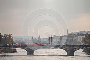 Panorama of Prague, Czech Republic, seen from the Vltava river, also called Moldau, with a focus on Most Legii, or Legion Most