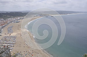 Panorama with Praia do Norte on Pedemeira bay sand beach of Nazare Resort in Portugal