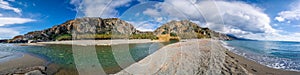 Panorama of Preveli beach at Libyan sea, river and palm forest, southern Crete.