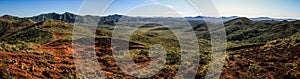 Panorama from the prony wind turbine viewpoint on the mountains and red soil of the South of Grande Terre, New Caledonia