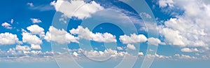 Panorama of real blue sky during daytime with white light clouds Freedom and peace. Large photo format Cloudscape