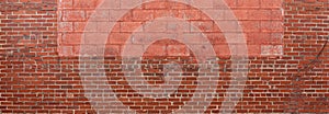 Panorama of red brick and painted concrete block wall, creative copy space opportunities